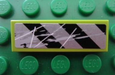 LEGO 63864pb007 Tile 1x3, yellow, with Danger Stripes and Scratches Pattern 1 sticker.