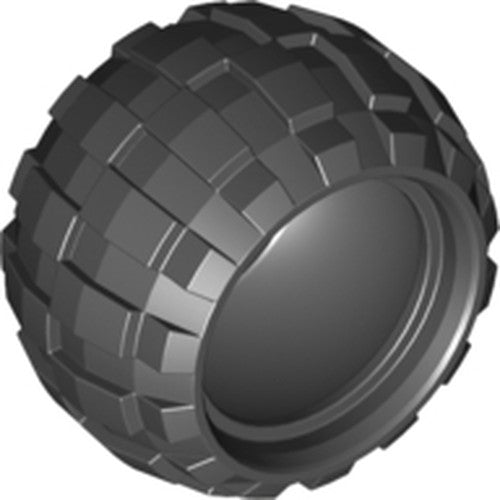 LEGO 6579 Tire 43.2 x 28 S Balloon Small, a dark grey rubber tire with a distinct blocky tread pattern, shown at an angle.