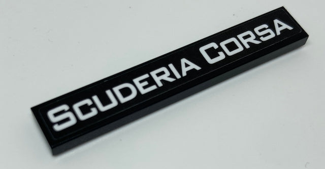 Black LEGO 1x6 tile with white 'SCUDERIA CORSA' text pattern, part of Set 75886.
