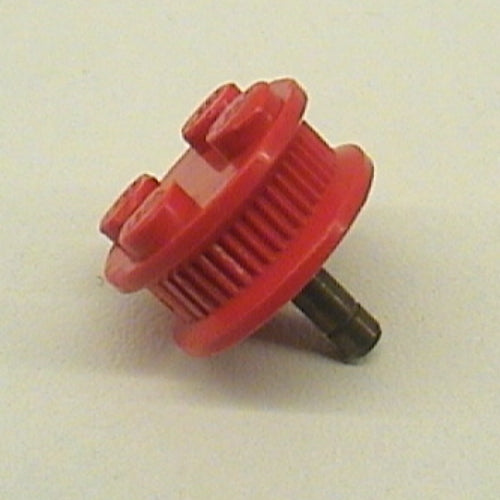 Red LEGO wheel (part 7039c) with 4 studs, a metal axle, and inner side traction teeth, shown at an angle.