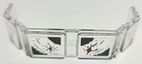LEGO 17457pb002 2x6x2 clear train front glass featuring dark brown cracks and dark bluish gray mud pattern.