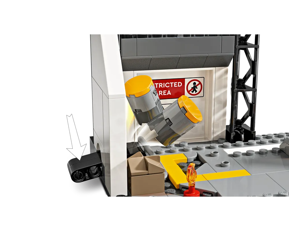 LEGO 76314 Captain America: Civil War Battle set showing a restricted area, falling canisters, and a play feature lever.