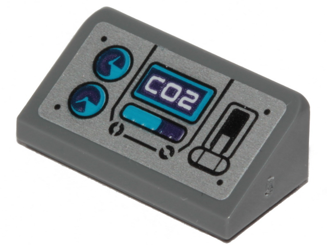 Dark gray LEGO slope brick with a control panel pattern featuring 'CO2' display, two gauges, and a lever.