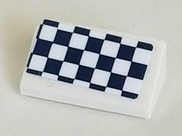A white LEGO Slope 30 1 x 2 x 2/3 brick with a black and white checkered sticker pattern on top.