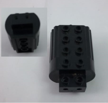 Black LEGO Electric Motor 12V Type 1. Features 2x4 studs on top and a connector port on the opposite end.