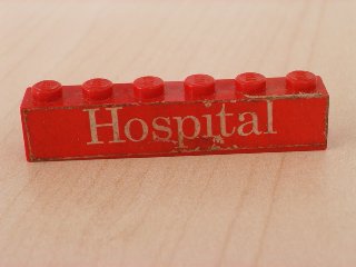 Worn red 1x6 LEGO brick featuring a white 'Hospital' text sticker, part of sets 363-1 and 555-1.