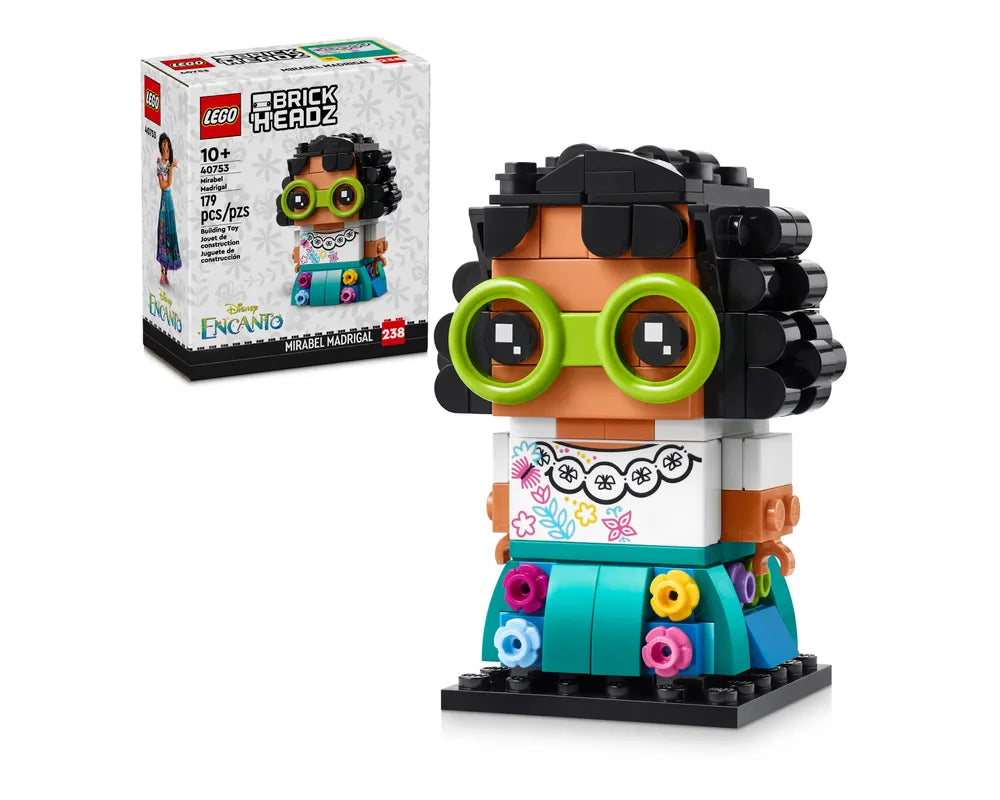 LEGO BrickHeadz 40753 Mirabel Madrigal figure with green glasses and colorful dress, shown next to its product box.