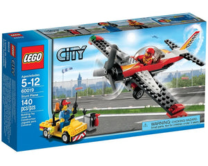 LEGO City 60019 Stunt Plane box showing a red and white plane with pilot, and a ground crew minifigure with yellow vehicle.