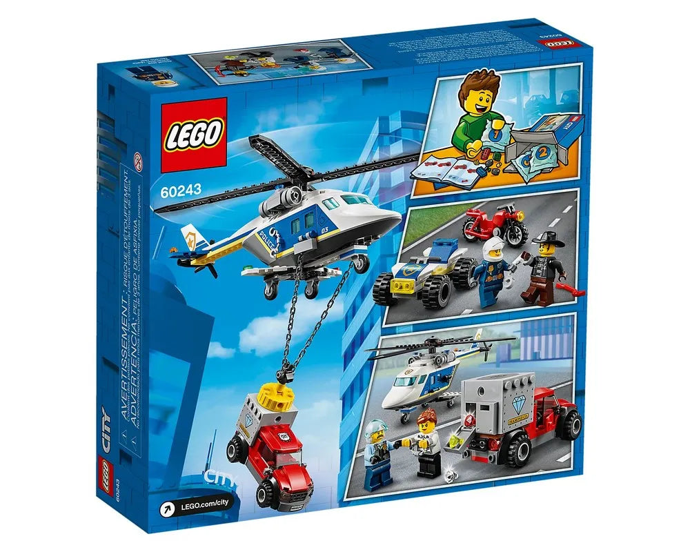 Back of LEGO City 60243 Police Helicopter Chase box. Displays police helicopter lifting a truck, minifigures, a quad, and other vehicles.