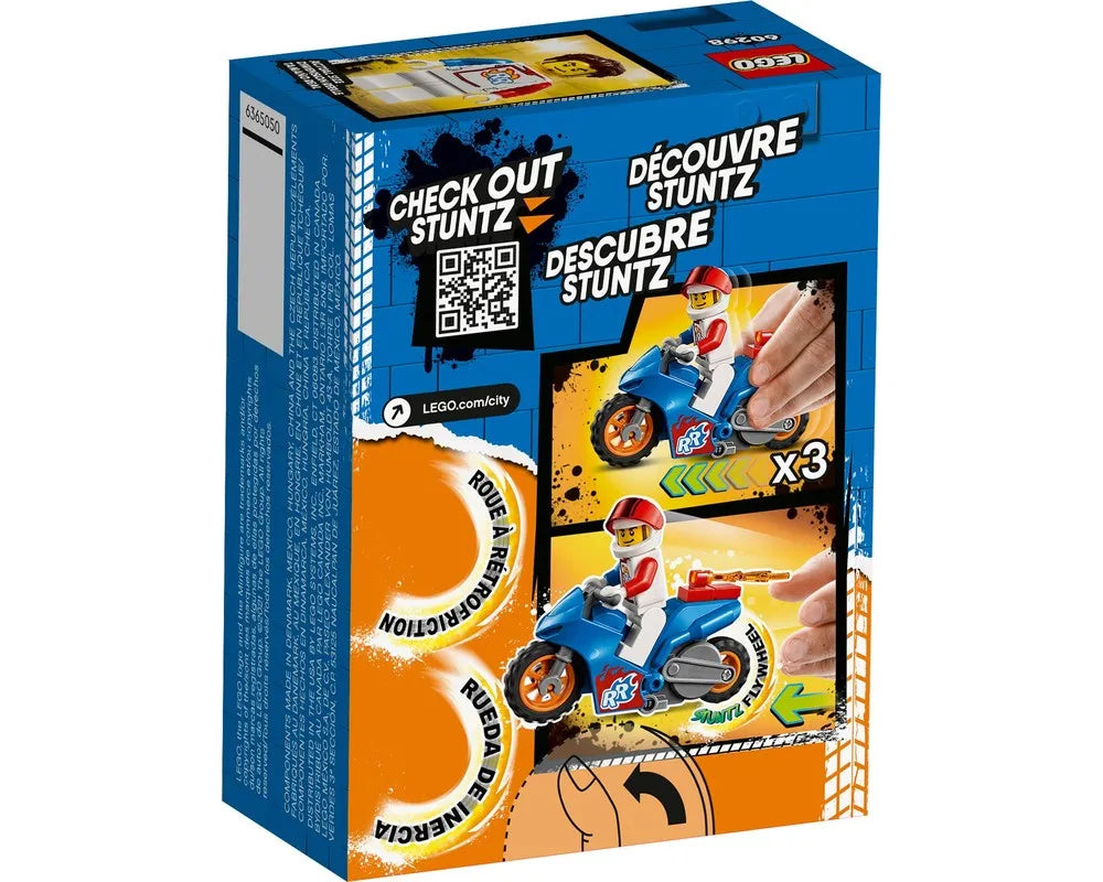 Back of LEGO City 60298 Rocket Stunt Bike box showing stunt bike flywheel action with minifigure, QR code, and multi-language text.