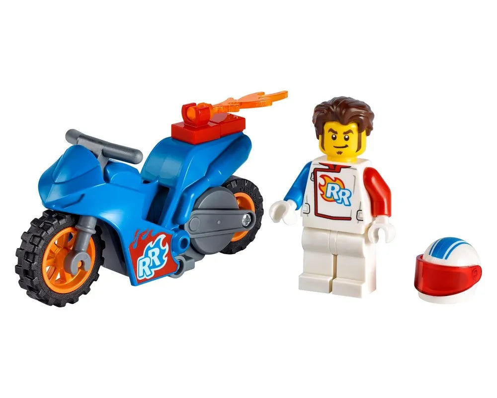 Blue LEGO Rocket Stunt Bike with a racer minifigure in a white, blue, and red suit, and a matching helmet.