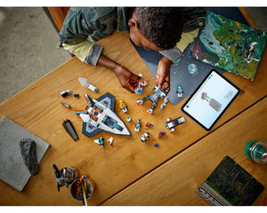 Child building LEGO City Space Explorers Pack (60441) with a space shuttle, minifigures, and tablet instructions.