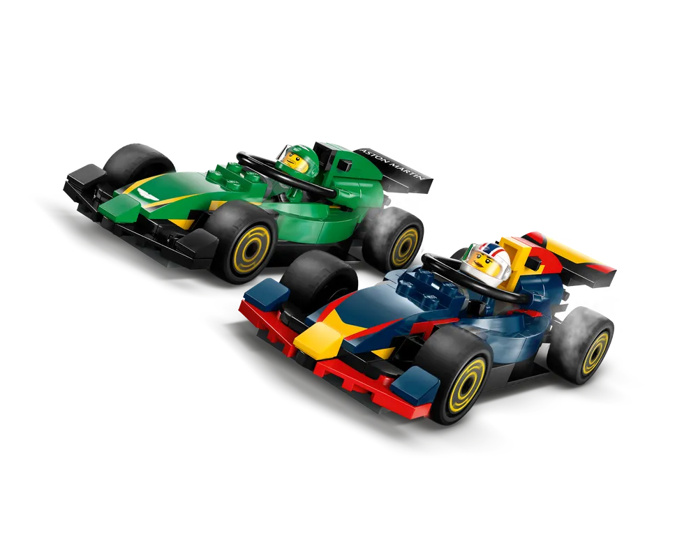 Two LEGO F1 race cars in motion on a white background, one green Aston Martin, and one blue, red, and yellow car.