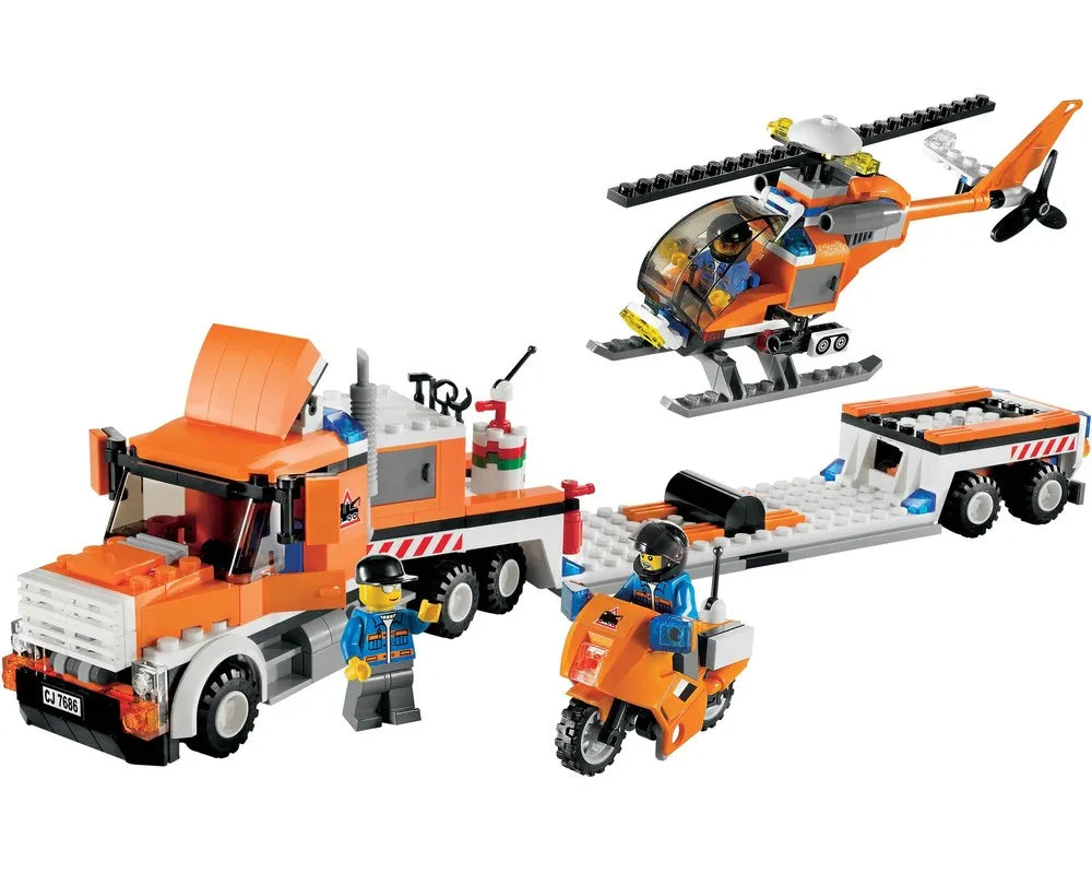 LEGO City 7686 Helicopter Transporter set featuring an orange truck, flatbed trailer, helicopter, scooter, and two minifigures.
