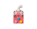 A pink LEGO drink character with a white straw, a smiling face, and colorful round details.