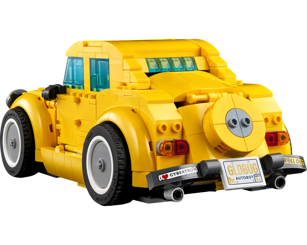 Rear-right view of a yellow LEGO Creator Bumblebee car (10338), showing custom license plate, spare tire, and tail lights.