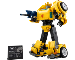 Yellow LEGO Bumblebee robot holding a blue blaster, standing next to a black display plaque with character stats.