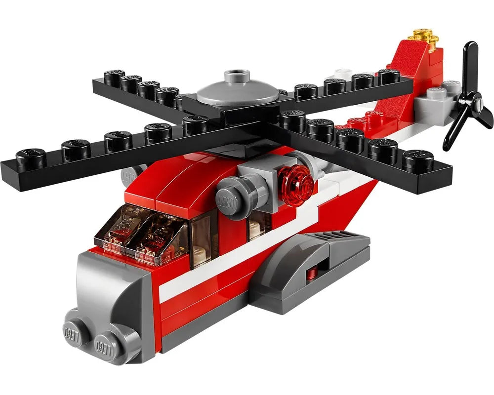 LEGO Creator 31013 Red Thunder helicopter, red, white, and gray with black main and tail rotors.