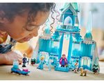 A young girl happily plays with the built LEGO Disney Elsa's Ice Palace set, featuring Elsa, Anna, Kristoff, Olaf, and Sven.