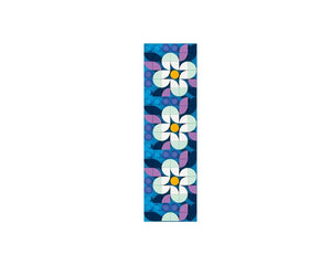 LEGO Dots 41955 Stitch-on Patch featuring three white and light green flowers with yellow centers on a blue background with purple and blue leaf-like shapes.