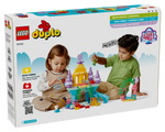 LEGO DUPLO 10435 Ariel's Magical Underwater Palace box showing two children playing with the assembled castle set.