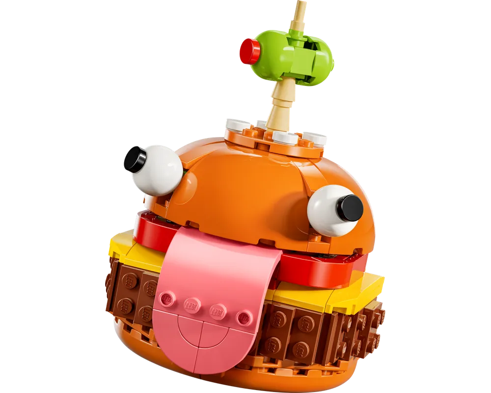 LEGO Fortnite Durrr Burger build, an orange burger character with large eyes, pink tongue, and green olive on top.
