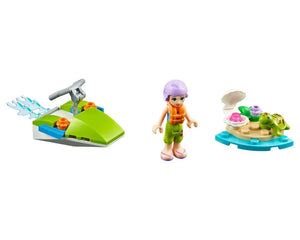 LEGO Friends Mia minifigure, a green jet ski with water splashes, and a small island with a turtle and seashell.