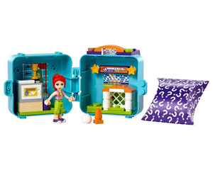 LEGO Friends Mia's Soccer Cube 41669, open showing Mia minifigure, locker room, soccer goal, and a purple mystery bag.