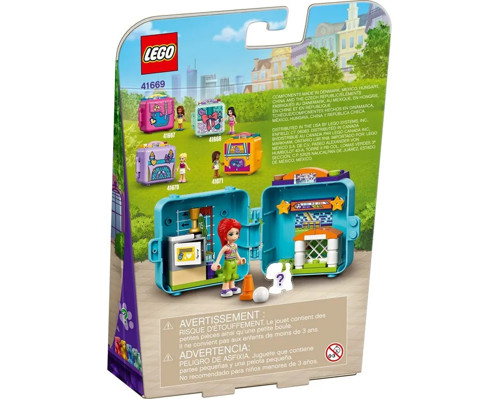 Back of LEGO Friends 41669 Mia's Soccer Cube packaging, showing Mia playing soccer in an open cube and other cube sets.