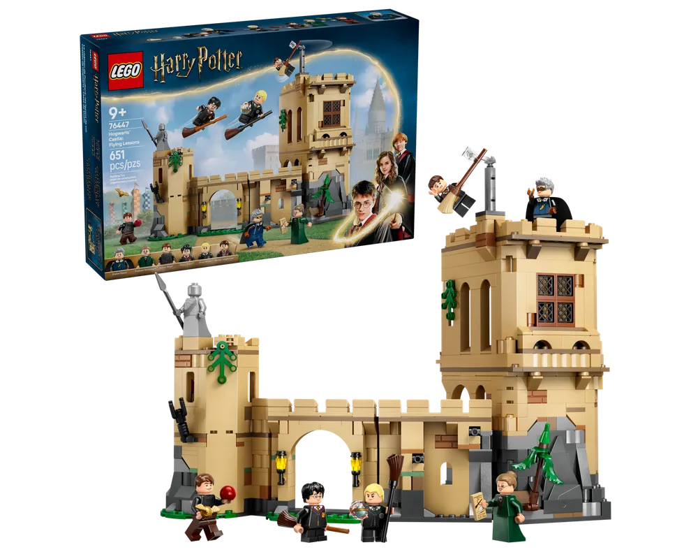 LEGO Harry Potter 76447 Hogwarts Castle: Flying Lessons. Tan castle section, minifigures flying on brooms and standing. Product box is visible.