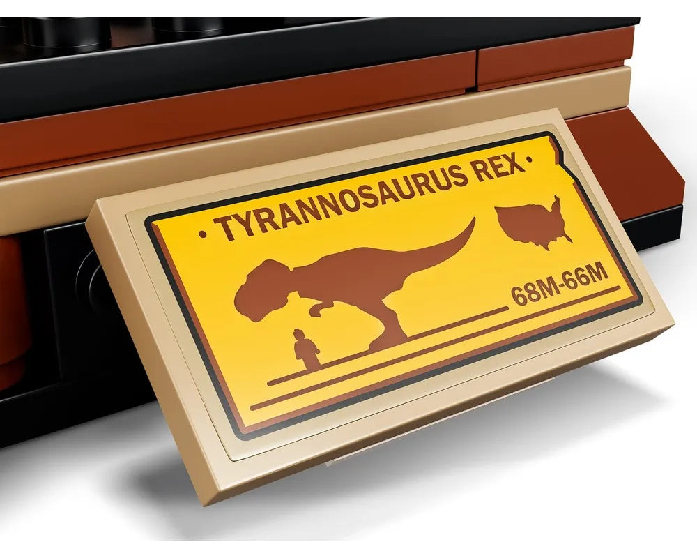 Tan LEGO display plaque for a T. rex fossil exhibition, showing dinosaur silhouette, human, US map, and '68M-66M' text.