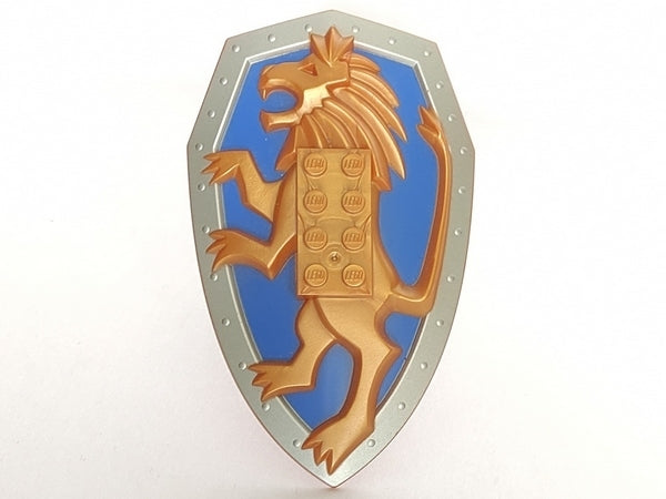 Silver LEGO shield with blue background and gold lion, featuring a 2x4 brick pattern with LEGO studs.