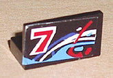 Black LEGO panel 1x2x1 with a sticker featuring a white number 7 with red outline and blue, white, and red swirl patterns.