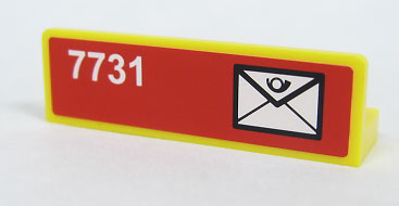 LEGO yellow 1x4x1 panel with a red sticker featuring '7731' and a white mail envelope symbol.
