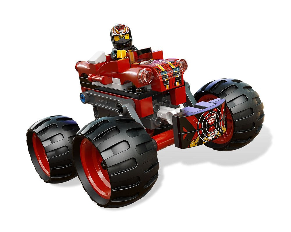 Red and black LEGO Racers 9092 Crazy Demon monster truck with minifigure driver, large tires, and sticker details.