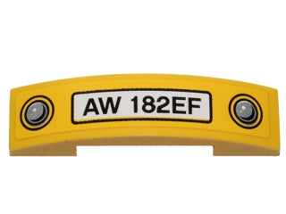 Yellow LEGO curved slope piece with 'AW 182EF' license plate and two headlights pattern.