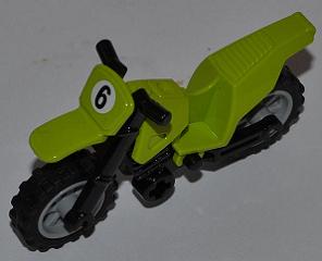 Lime green LEGO dirt bike toy with black chassis and handlebars, gray wheels, and a white number 6 on the front.