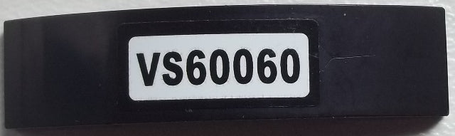 LEGO black curved slope brick with a white sticker displaying 'VS60060' text, part of Set 60060.
