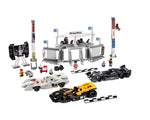 LEGO Speed Racer 8161 Grand Prix Race set featuring three race cars, minifigures, a race tower, and pit stop accessories.