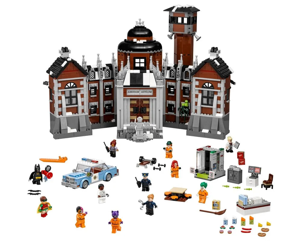 LEGO Batman Movie Arkham Asylum 70912 set with main building, watchtower, police car, and many minifigures including Batman, Joker.