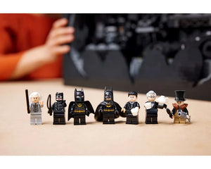 LEGO minifigures: two Batman, Catwoman, Commissioner Gordon, Bruce Wayne, Alfred, and Penguin from the Batcave Shadow Box.