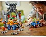 Child plays with LEGO Super Mario Bowser's Castle set, featuring Bowser and Yoshi in their go-karts.