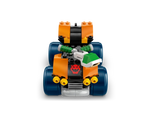Front view of an orange and black LEGO Super Mario Bowser-themed vehicle with blue wheels, a Bowser emblem, and a green shell.