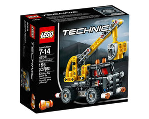 LEGO Technic 42031 Cherry Picker set box featuring a built yellow and black cherry picker model against a dark urban background.