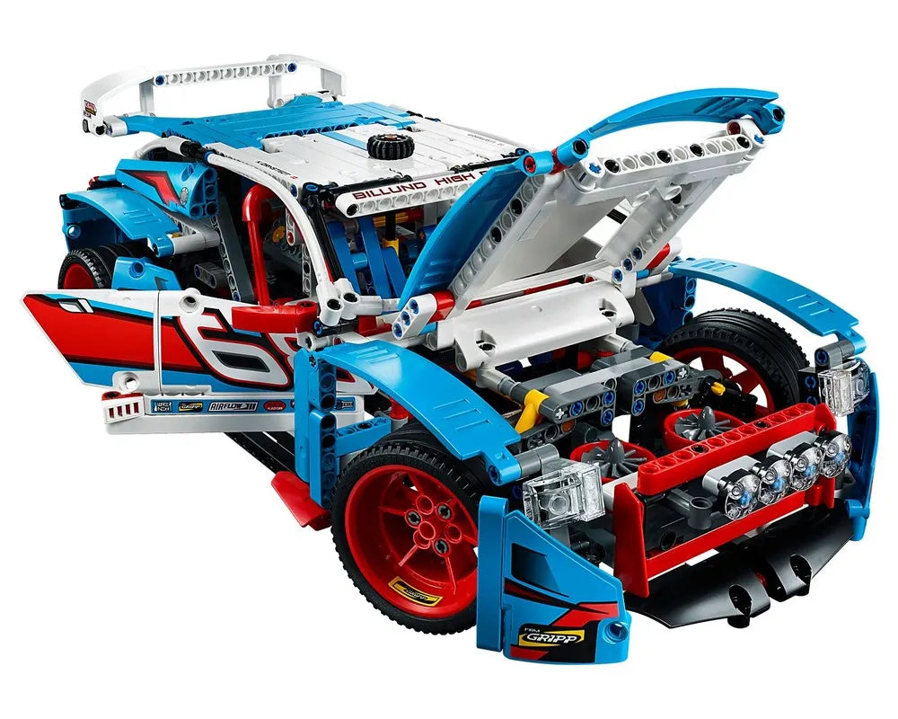 LEGO Technic 42077 Rally Car, blue, white, and red, with open door and hood revealing detailed interior and engine.
