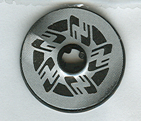 LEGO Technic 3x3 disk with silver and black motorcycle disk brake pattern, from set 8370.