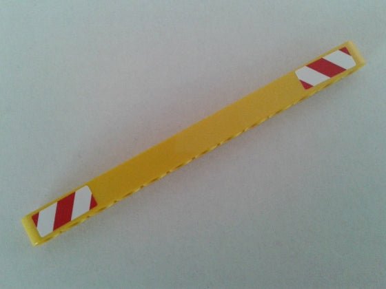 Yellow LEGO Technic 1x13 thick liftarm with red and white danger stripe stickers on both ends.