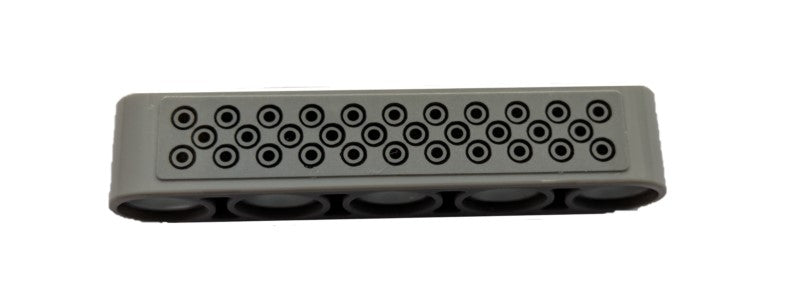 Light grey LEGO Technic Liftarm Thick 1x5 with black circles tread plate pattern on top.