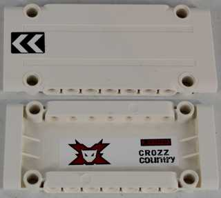 Two white LEGO Technic Panel Plates 5x11x1. One with black chevrons, the other with a red Team Extreme logo and 'CROZZ COUNTRY'.
