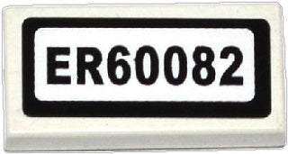 White LEGO 1x2 tile with black border and 'ER60082' pattern.